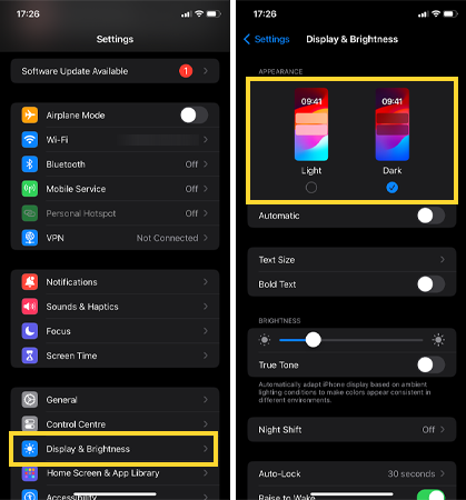 Select Display and Brightness and switch to dark mode